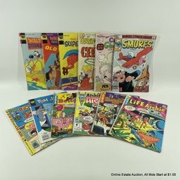 12 Assorted Comics Including Archie, Smurfs, Tom And Jerry, Dennis The Menace And More