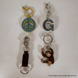 Four Assorted Vintage Coach Key Rings
