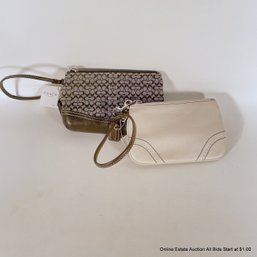 Two Coach Wristlets With Original Tags Attached