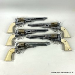 Five Toy Cap Guns