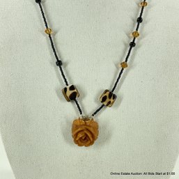 Glass Bead Necklace With Carved Resin Rose Pendant