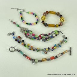 Five Assorted Colorful Glass, Stone, And Wood Bead Bracelets