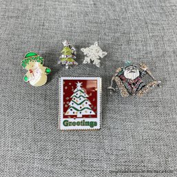 Five Assorted Holiday Pins With Christmas Trees And Santa