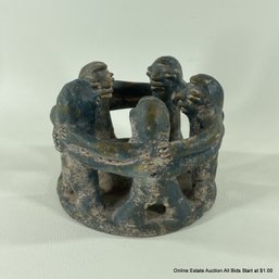 Sculpted Circle Of Figures Candle Holder