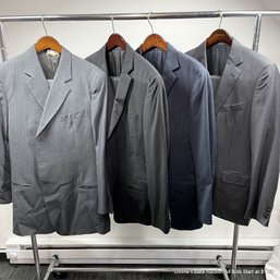 Four Men's Suit From Armani, Ermenegildo Zegna, And Boss