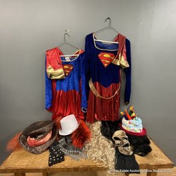 Assorted Halloween Costume And Wigs For Supergirl, Mad Hatter, More
