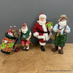 Set Of Three Santa Statues In Various Themes