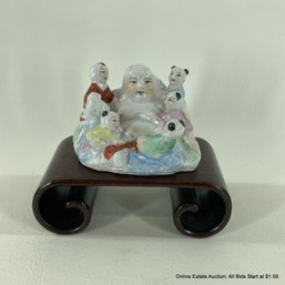 Chinese Porcelain Fertility Buddha With Wood Stand