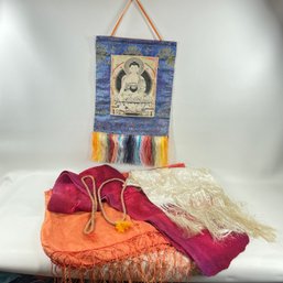 Tibetan Shawls, Mala Beads, And Buddha Wall Tapestry