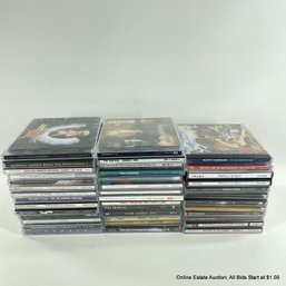 Collection Of 39 Assorted CDs By Various Artists Taj Mahal, Bob Marley, Stevie Ray Vaughan & More
