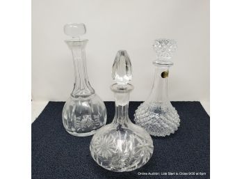 Lot Of Three Pressed And Cut Glass Decanters