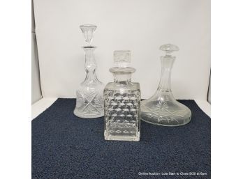 Three Cut & Pressed Glass Decanters With Stoppers