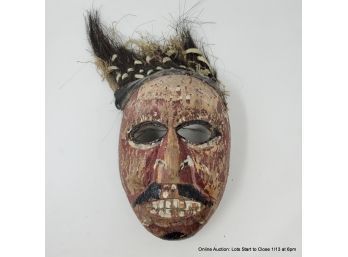 Carved Wood Mask With Grass And Raffia Hair