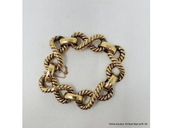 18K Yellow & White Gold Twisted Link Bracelet  Measures 19.5mm Wide By 8 Inches Long. Total Weight 68.9grams