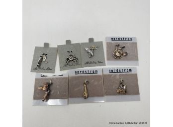 Seven Sterling Silver Charms