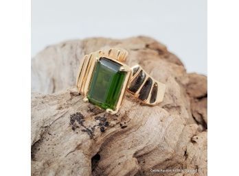 One 14K Yellow Gold Ring Features An Emerald Cut Green Tourmaline. Ring Weighs 6.74 Grams Size 6.5