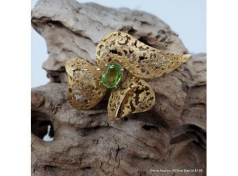 One 18K Yellow Gold, Filigree Brooch With An Oval Mixed Cut Peridot (1.88)carats Total Weight 13 Grams