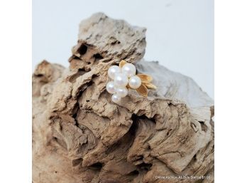 One 18K Yellow Gold Ring With Seven Cultured Akoya Pearls Measure 4.1mm-5.8mm In Diameter. Total Weight 7.77g