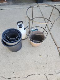 Assorted Planters, Sprayer, And Sprinkler