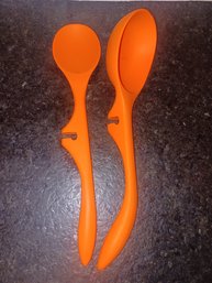 Orange Rubber Cooking Utensils That Will Suit On Edge Of Pan