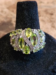 Manchurian Peridot  3.28ctw With .17ctw White Topaz Sterling Silver Ring