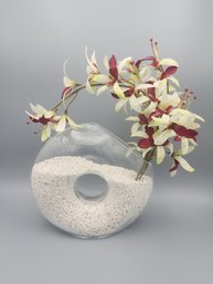 Ikebana Vase With Flowers And Small Gravel