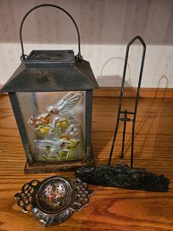 Hummingbird Lantern And Metal Items