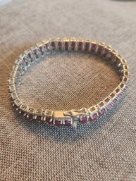 Sterling Silver And Ruby Tennis Bracelet 3in