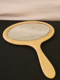 Vintage 1950s Handheld Yellow Celluloid Beveled Glass Mirror