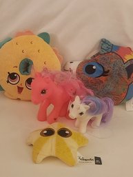 3 Stuffed Animals And 2 Ponies