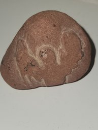 Rock With Bird Carved In It