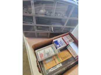 Assorted Staples  And A Box Of Mixed Screws