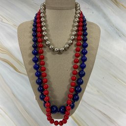 049 Lot Of Three Ball Beaded Necklaces, Red, Blue, And Silver