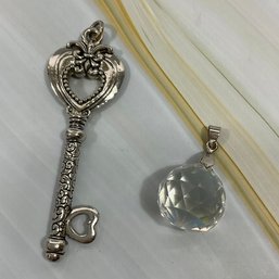 054 Lot Of Two Necklace Pendants, Silver Tone Engraved Key, Glass Crystal Ball