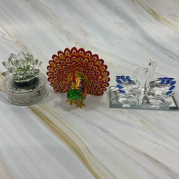 173 Lot Of Three Crystal/Enameled Display Figurines, Rotating Lotus Flower, Two Swans, Peacock Trinket Box