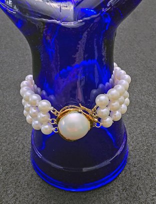 Triple-strand Akoya Cultured Pearl Bracelet With 14k Gold Mabe Pearl Clasp
