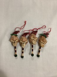 Set Of Four Creepy Santa Head Ornaments