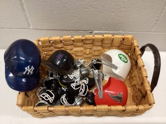 Basket Of Vintage Plastic Sports Helmets