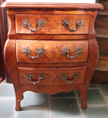 Small Inlaid Wood 3 Drawer Bombe Chest With Elaborate Brass Handles.