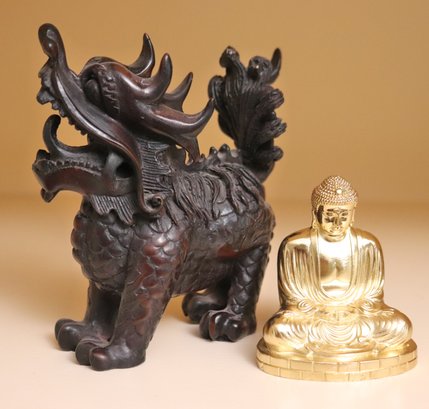 Seated Gold Metal Buddha And Carved Temple Lion.