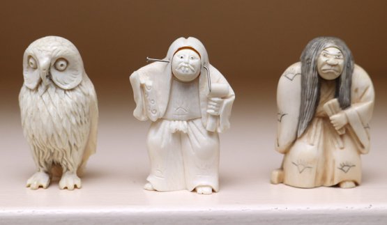 Three Antique Carved Bone Figures, Two Wisemen With Revolving Faces And An Owl.