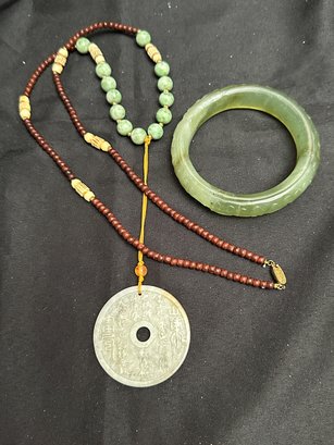 30 Inch Necklace With Wood Beads, Carved Bone Spacers And Jadelike Beads With Additional 5 Inch Pendant