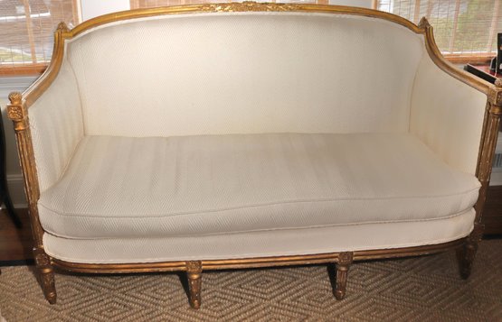 19th Century French Gilt Sofa Newly Upholstered And Restored With An Antiquated Finish