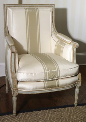 Vintage French Style Armchair With A Custom Distressed Finish And Cream Toned Silk Like Fabric