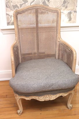 Unique French Style Armchair With Caned Back And Double Caned Sides.