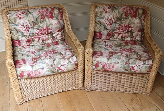 Pair Of Vintage Rattan Armchairs With Floral Cushions.