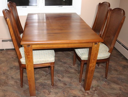 Vintage Custom Teak Cozy Wood Dining Table Made In Bali With 4 Chairs That Have A Caned Backrest, Extra Leaf