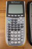 Lot Of 4 Texas Instrument Graphing Calculators