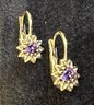 14K YG Pair Of Dainty Flower Earring With Amethyst Center Stone.