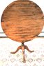 Vintage Wood Tilt Top With A Rich Wood Grain Finish Table